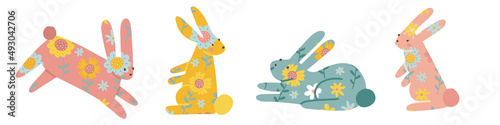 Silhouette of rabbits sitting and lying down. Ester bunnies with flok flower decor. Easter spring illustration in a flat hand drawn trendy style.
