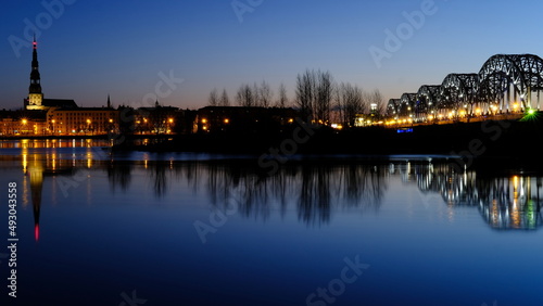 Dawn over the Daugava River in spring with the railway bridge as a backdrop © IHAR