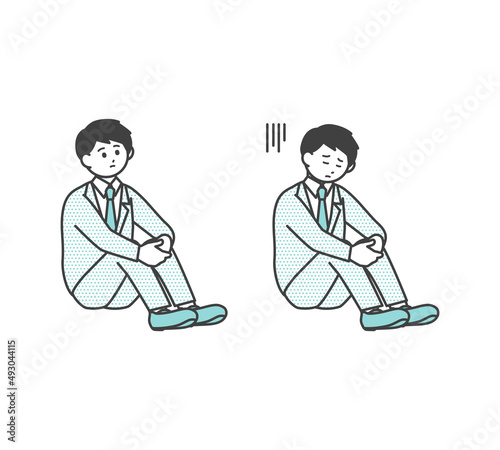 体操座りして落ち込んでいるビジネスパーソンのイラスト素材