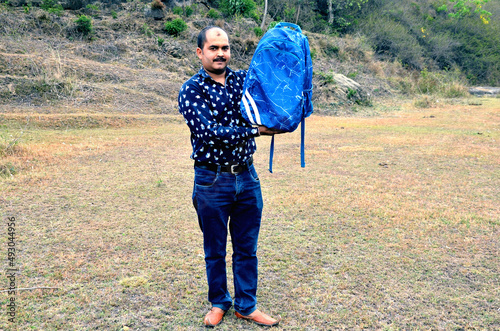 Man Show His Bag towards Camera Himachal Pradesh India photo