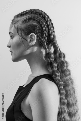Beautiful portrait of a girl with an art hairstyle