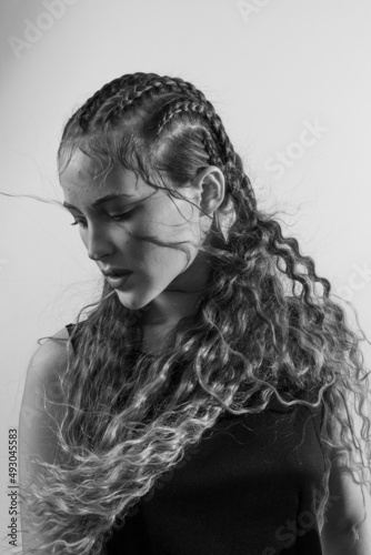Beautiful portrait of a girl with an art hairstyle
