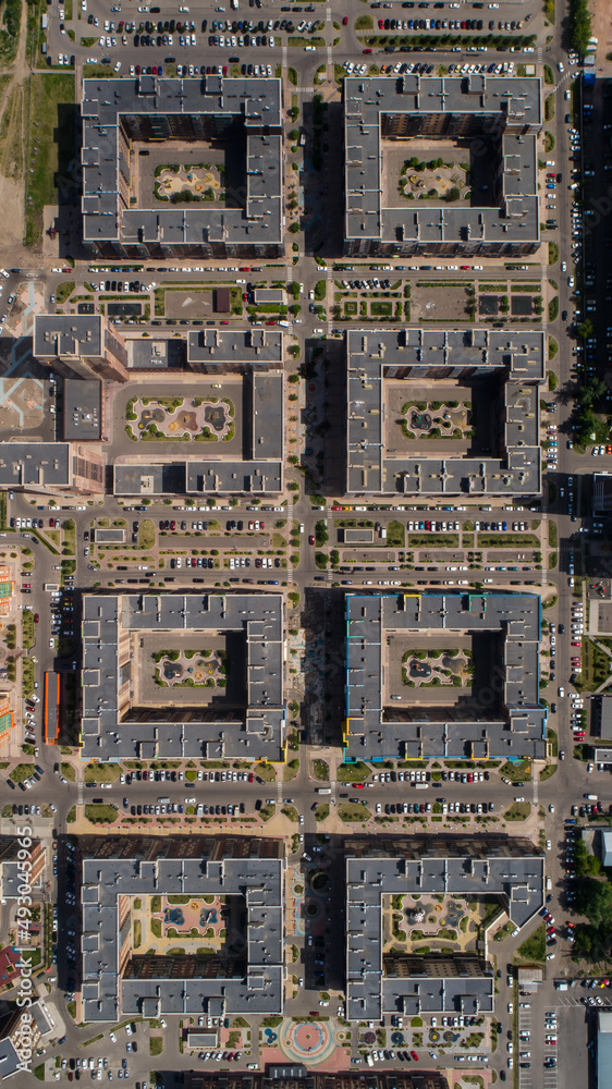 Residential area top view. several identical flat houses with courtyards. Nice residential area. low-rise urban development. Novyts residential area of the city.