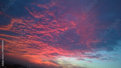 a beautiful sunset purplish clouds