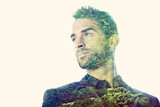 Survival of the fittest. Composite image of a handsome man superimposed with an image of a forest.