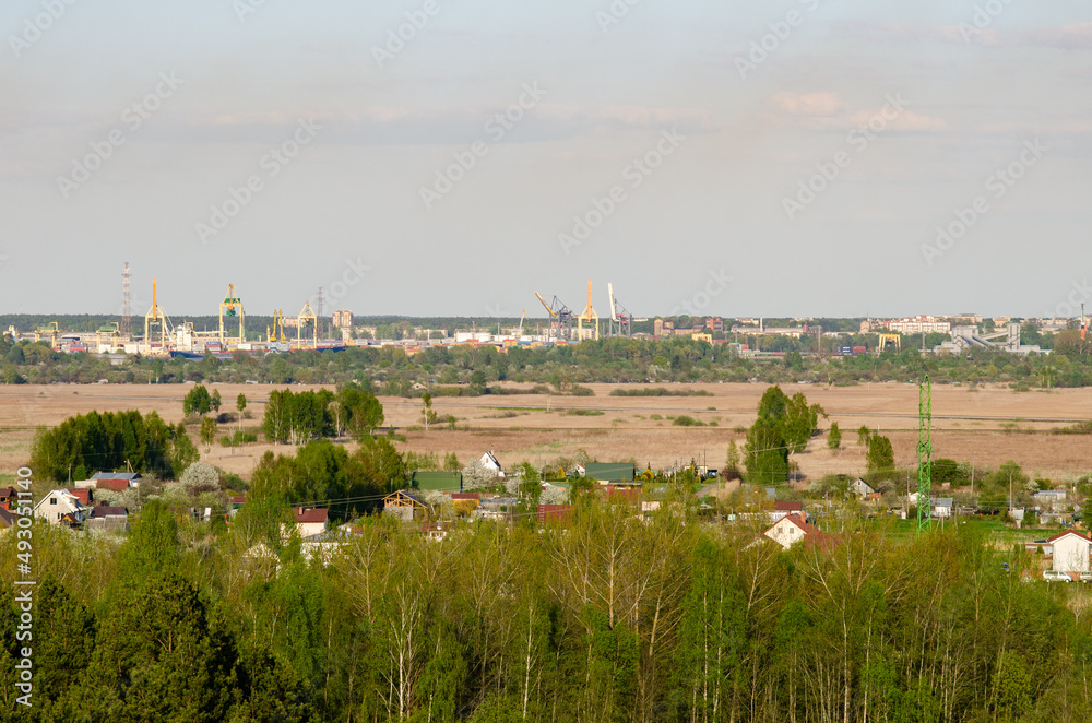 city buildings behind the countryside