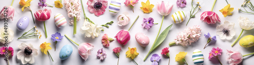 Spring flowers and easter eggs flatlay photo