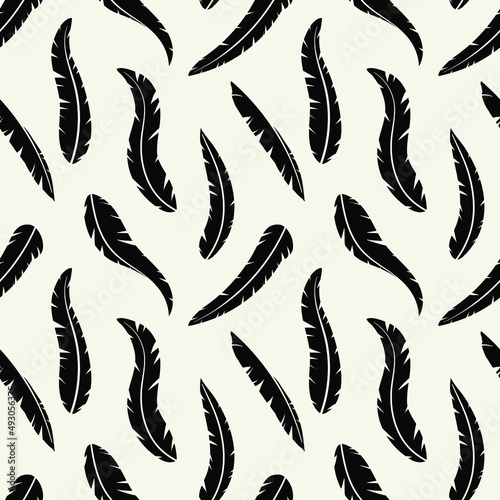 Seamless vector pattern with feathers. Trendy background with feathers silhouettes