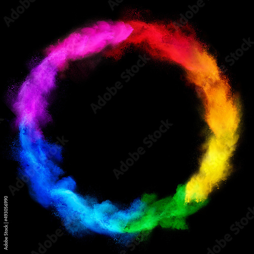 colorful rainbow holi paint color powder explosion ring circle isolated dark black wide panorama background. peace rgb beautiful party concept