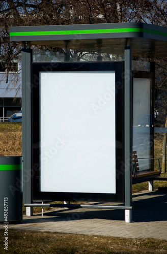 Outdoor advertising billboard at the bus stop.