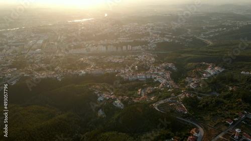 Aerial view of the city of Coimbra, Portugal, during sunset.