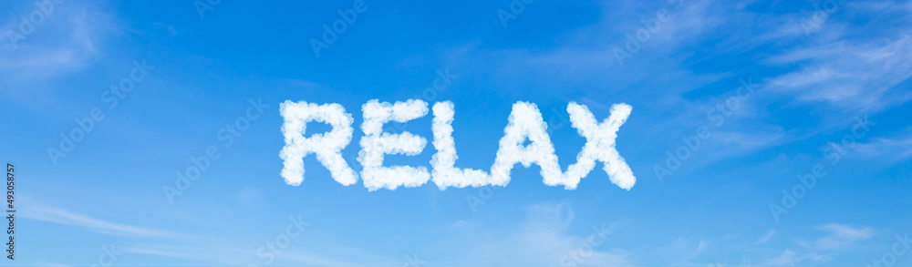 Relax word made of clouds on blue sky background Relax word made of clouds on blue sky background