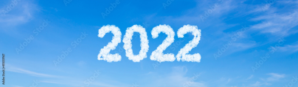 Year 2022 word made of clouds on blue sky background Year 2022 word made of clouds on blue sky background