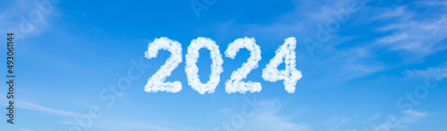 Year 2024 word made of clouds on blue sky background