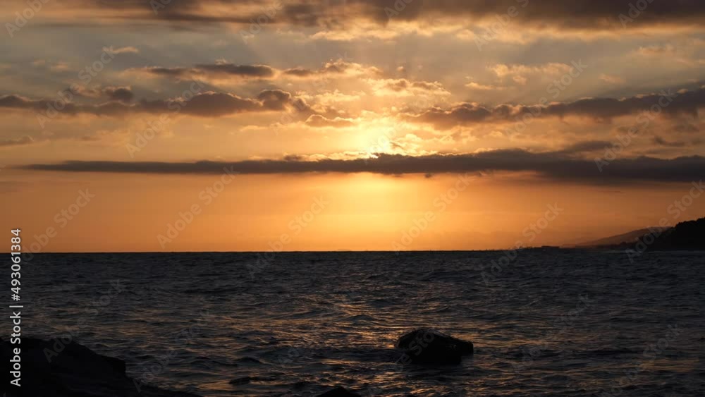 Mediterranean sea at sunset golden hour cloudy sky an amazing beach seascape Mediterranean sea at sunset golden hour cloudy sky an amazing beach seascape