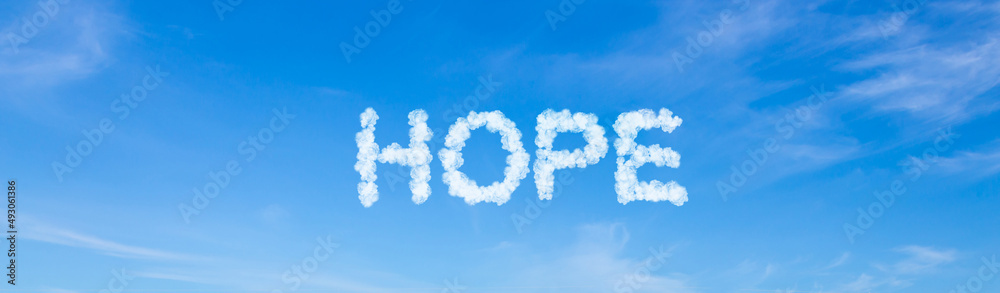 Hope word made of clouds on blue sky background Hope word made of clouds on blue sky background