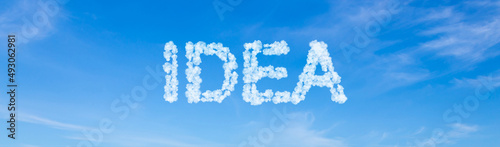 Idea word made of clouds on blue sky background