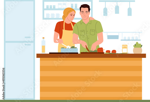 Couple cooking together. Husband and wife preparing homemade dinner