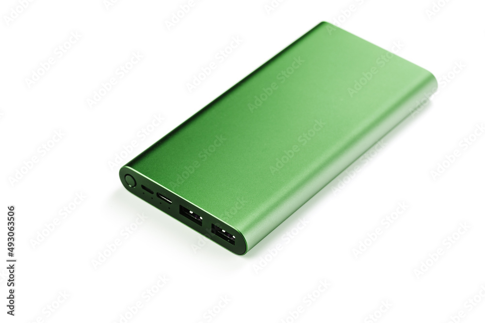 Green Power Bank on a white background for charging mobile devices Green Power Bank on a white background for charging mobile devices