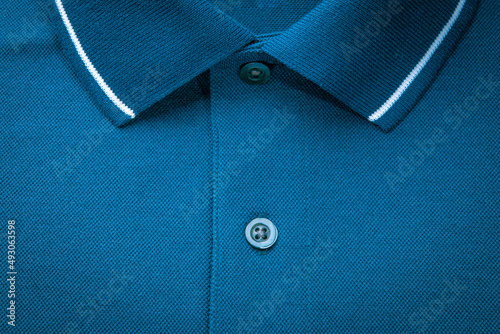 Dark indigo polo shirt focus on fabric details