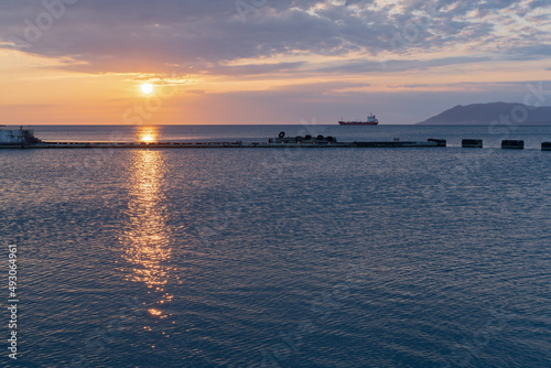 Sunset on the sea, a variety of colors and shades of the rising sun. Seascape. © nikolay_alekhin