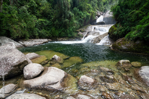 Beautiful view to green atlantic rainforest waterfall in Itatiaia