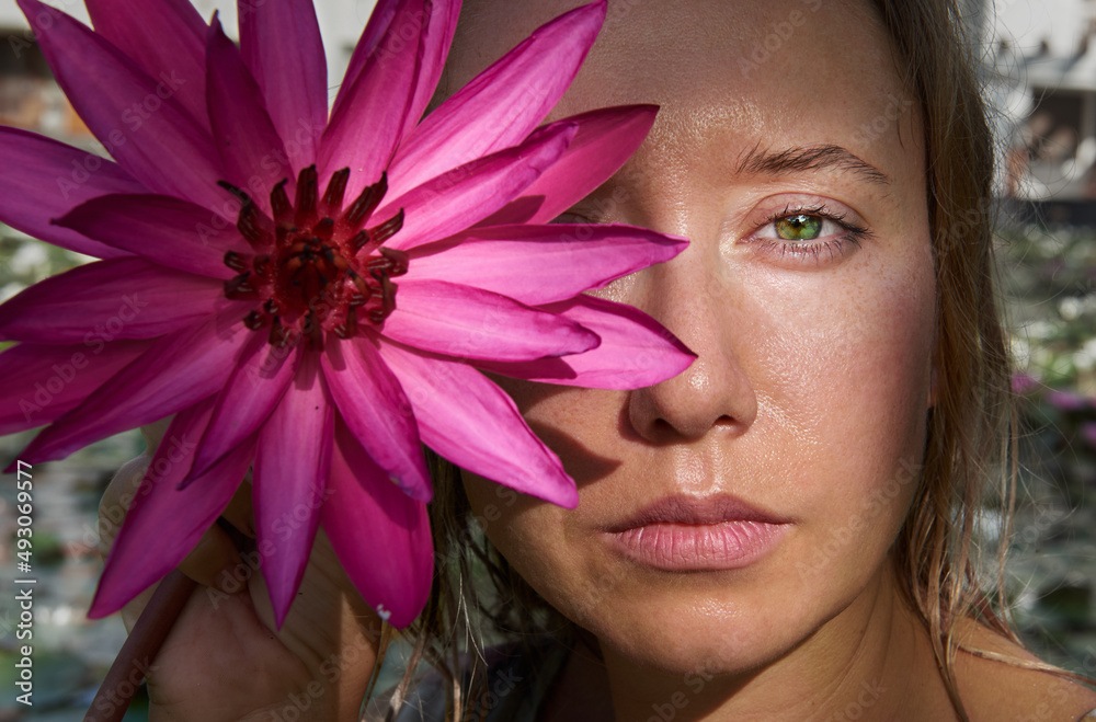 portrait of a girl with a flower on half of her face portrait of a girl with a flower on half of her face