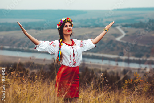 Portrait of woman in traditional ukrainian embroidery. photo