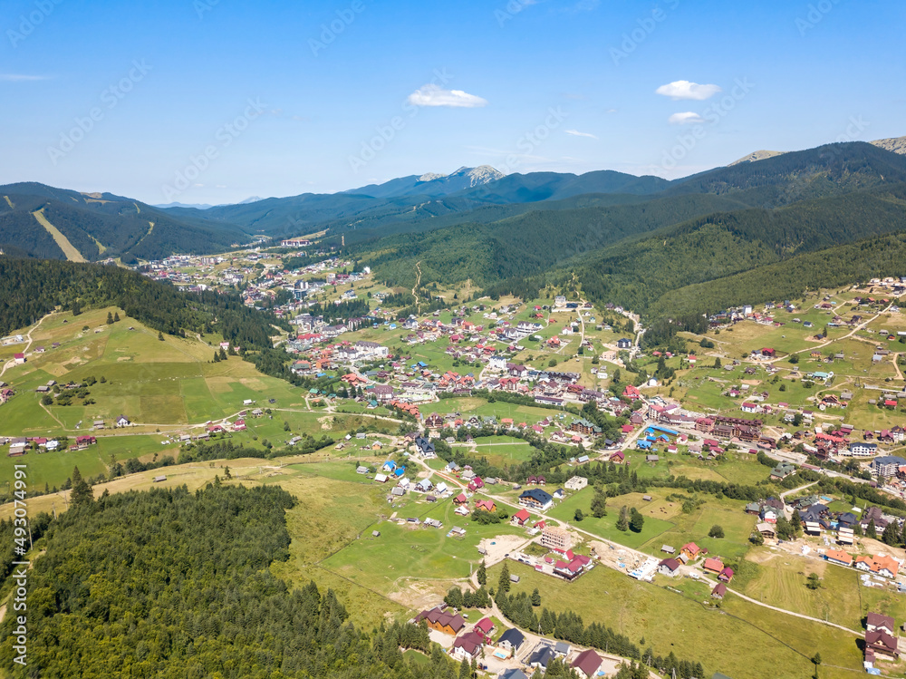 Mountain settlement in the Ukrainian Carpathians. Aerial drone view.
