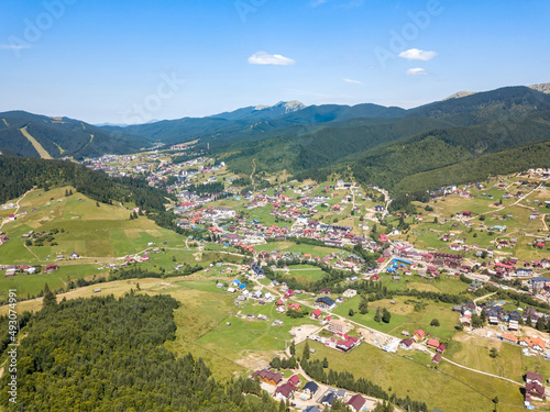Mountain settlement in the Ukrainian Carpathians. Aerial drone view.