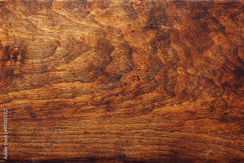 Dark stained wood plywood veneer board background