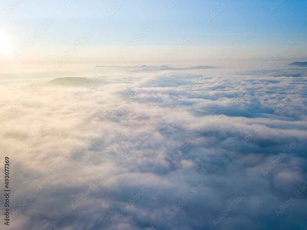 High flight above the clouds. Aerial drone view. High flight above the clouds. Aerial drone view.