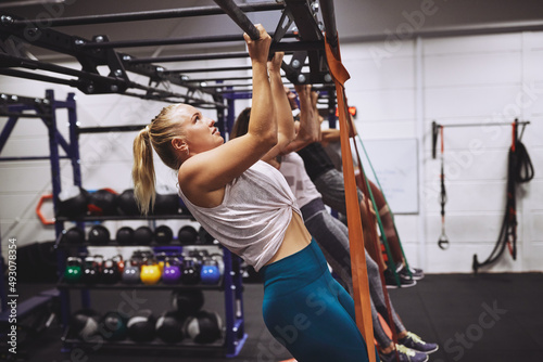 People working out with resistance bands at the gym