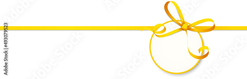 yellow colored ribbon bow with hang tag