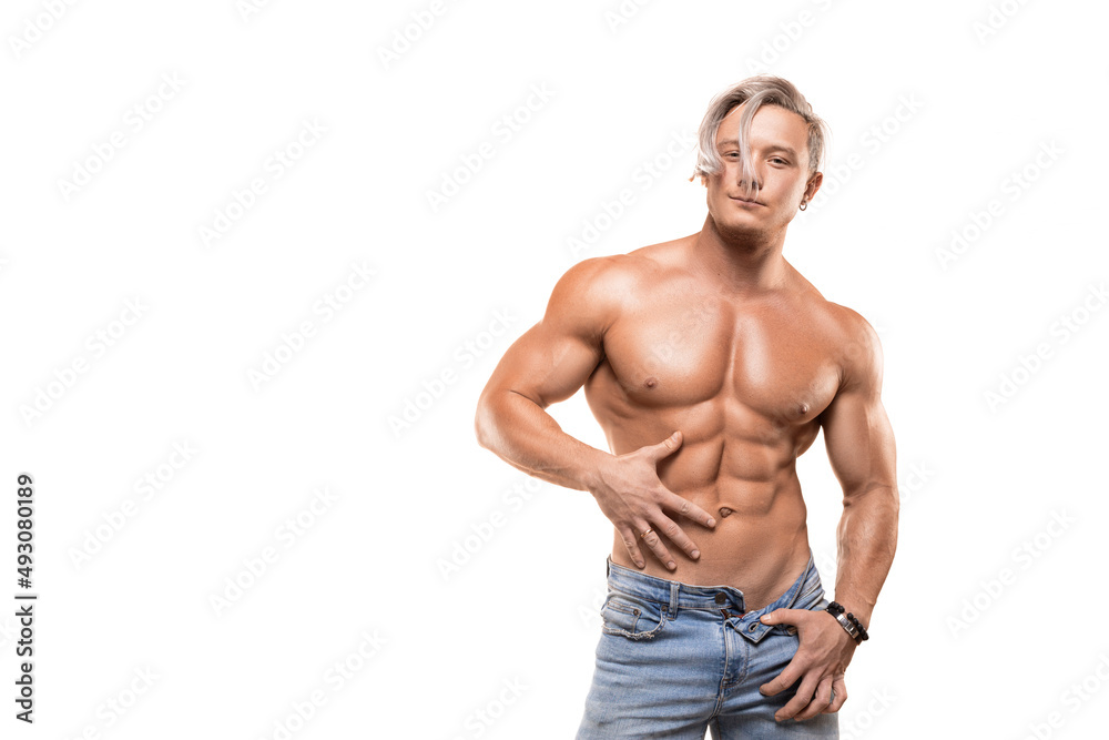 Strong healthy athletic man in jeans looking at camera - isolated on white. Strong healthy athletic man in jeans looking at camera - isolated on white.