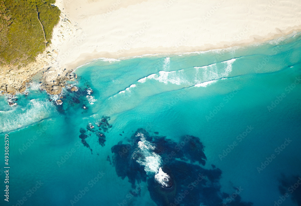 Hidden gem of a beach. Aerial shot of a secluded beach and its turquoise water.
