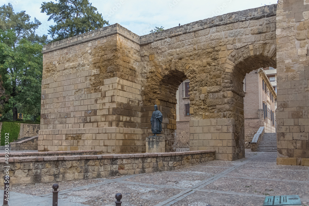 View of the statue of Ibn Hazam, Abū Muḥammad ʿAlī ibn Aḥmad ibn Saʿīd ibn Ḥazm, a Muslim leader, located in the center of the city of Cordoba at the Seville Gate, Spain
