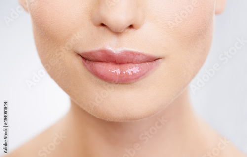 Lip stick shades for every mood. Closeup studio shot of models mouth.