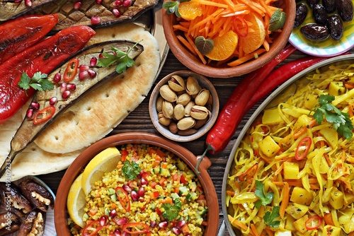  African food table concept. Traditional African or middle eastern dishes assortment. Selective focus