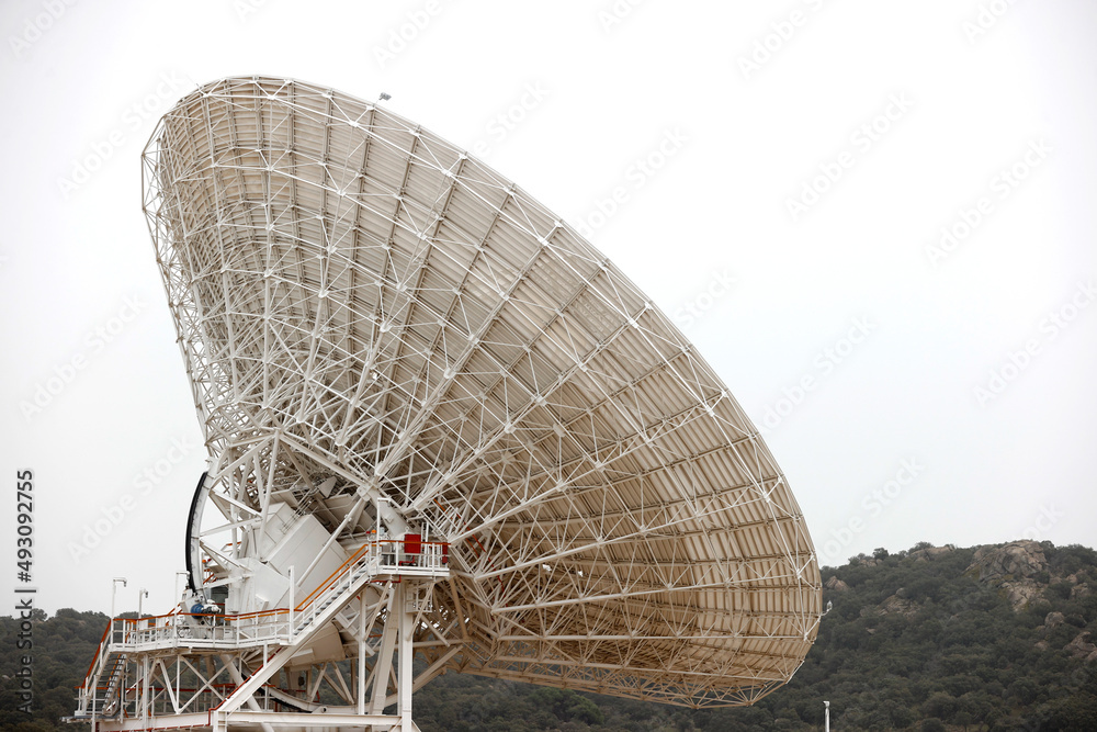 Foto Stock satellite dish radar antenna station in field. parabolic antennas.  Big parabolic antenna against sky. Satellite dish at earth station with a  sky. | Adobe Stock