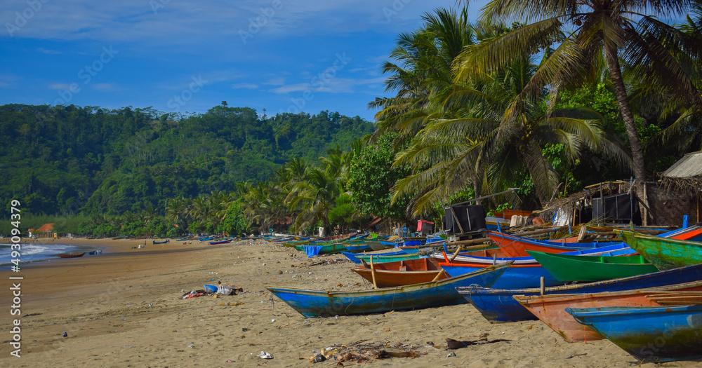 Traditional wooden fishing boats and beautiful hilly beach in East Java province, Indonesia.
boat background on the beach, beautiful Indonesian beaches. beach background. Traditional wooden fishing boats and beautiful hilly beach in East Java province, Indonesia.
boat background on the beach, beautiful Indonesian beaches. beach background.