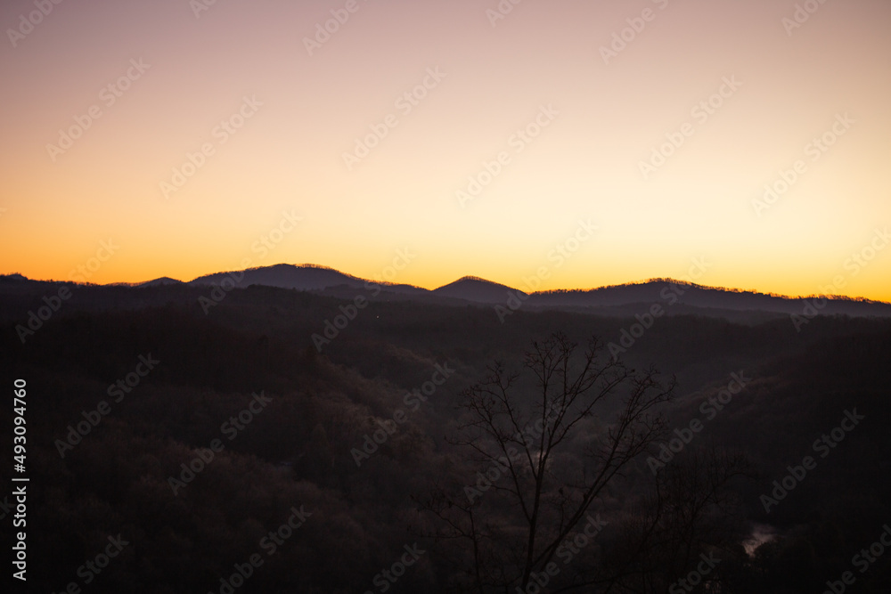 Beautiful sunset over the mountains in a forest in north Georgia 
