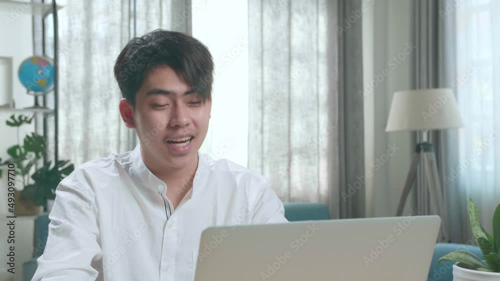 Close Up Of Asian Man Student Using Computer To Study Online At Home
Close Up Of Asian Man Student Using Computer To Study Online At Home