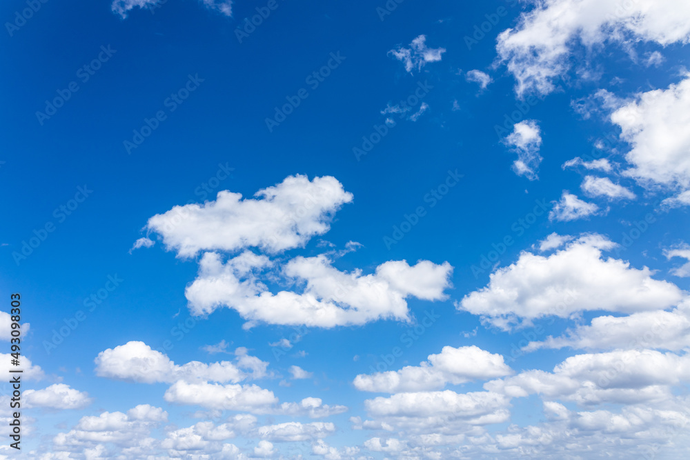 Beautiful saturated sky with white fluffy clouds. Beautiful saturated sky with white fluffy clouds.