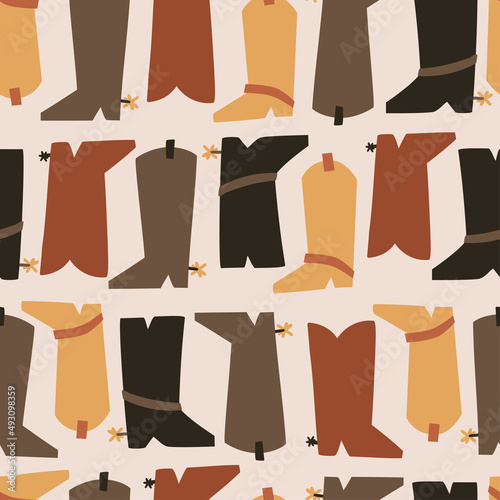 seamless pattern with cowboy boots. vector illustration