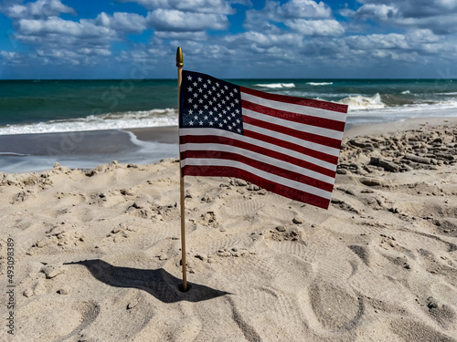 American flag on the coast of the Atlantic Ocean, a symbol of freedom and independence.