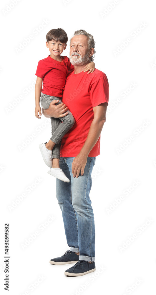 Little boy and his grandfather in red t-shirts on white background Little boy and his grandfather in red t-shirts on white background