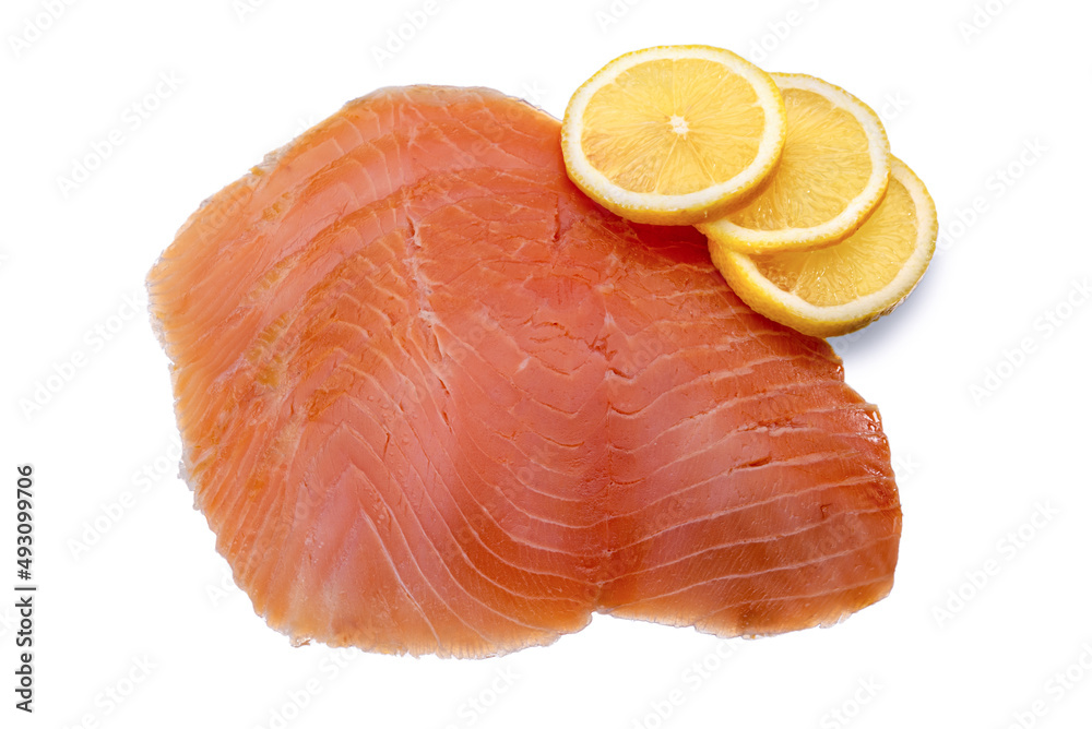 Smoked salmon slices with lemon slices isolated on white background, top view, flat lay