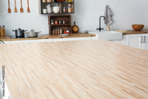 Empty wooden table top in l...