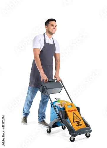 Smiling young male janitor ...